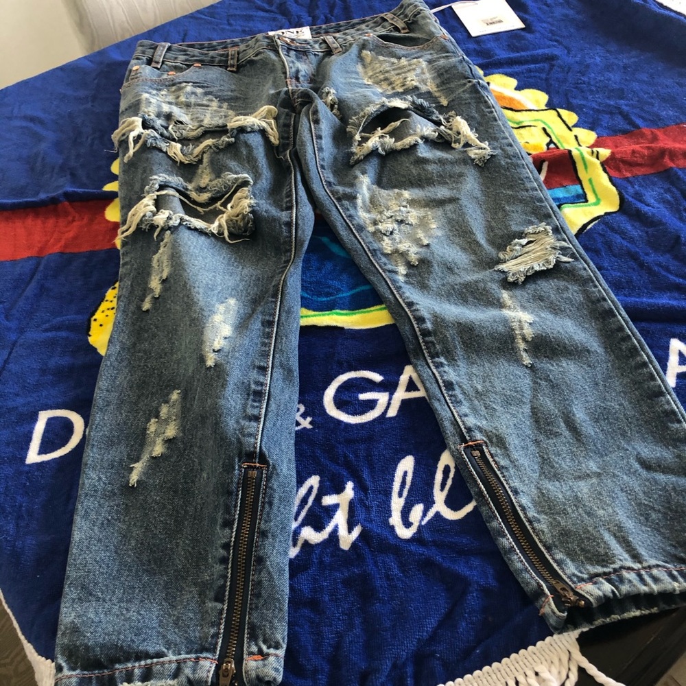 One ripped jeans
